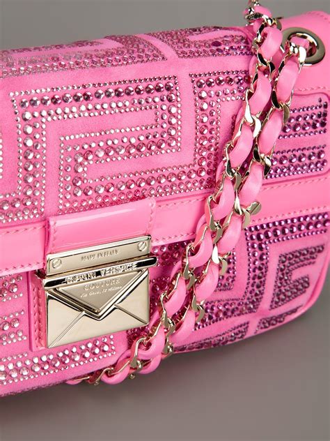 versace gambe bora|versace pink shopping bag.